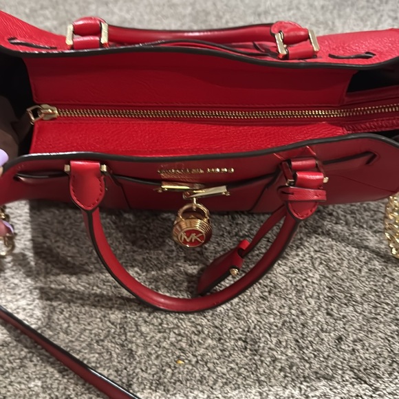 Large Michael Kors handbag with gold accents. - Picture 3 of 6